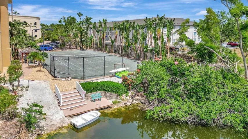 Clay court tennis with Kayak launch and storage