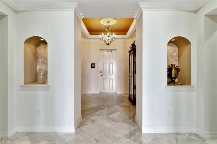Marble floors through out this home with many lite art niches..