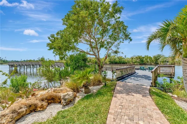 Path leads you to the boardwalk where you can enjoy private access to Lakes Park!