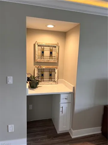 Bar area with opening for wine refrigerator