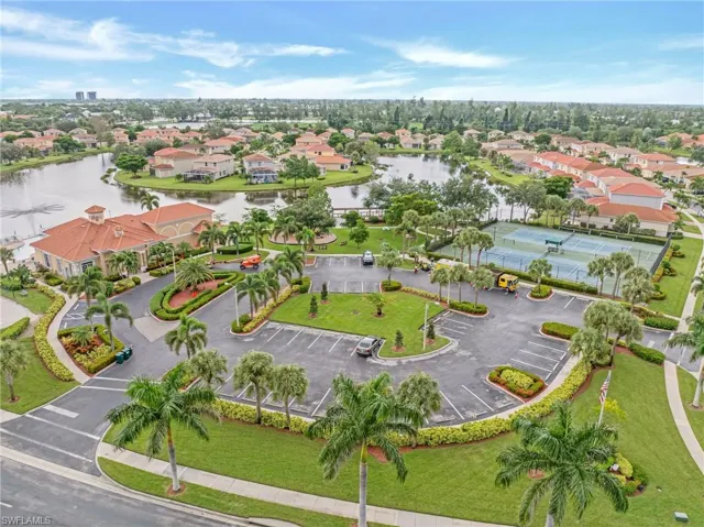 Aerial perspective of suburban area with a large body of water