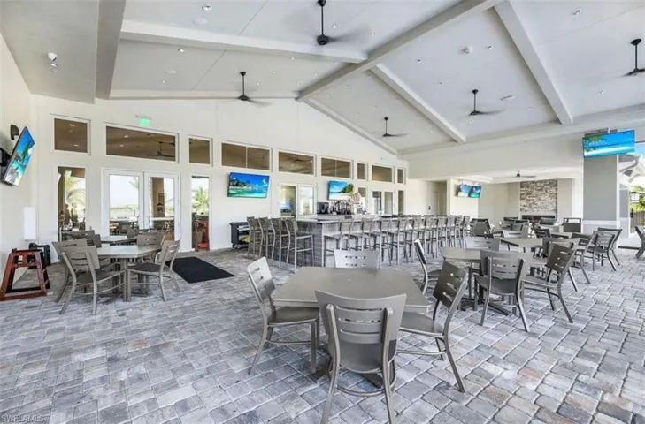 View of patio / terrace with a ceiling fan and outdoor dining area