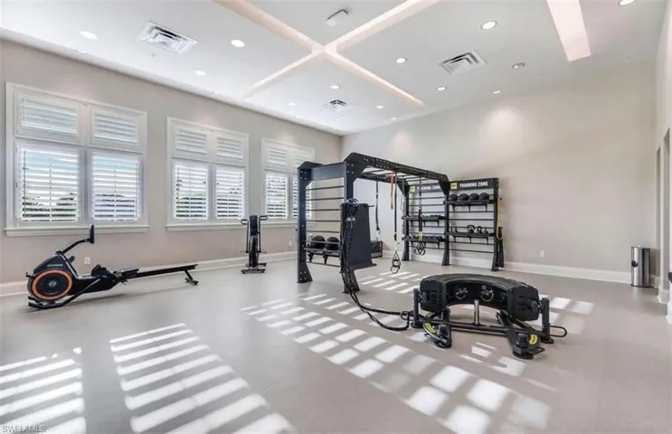 Exercise room featuring recessed lighting