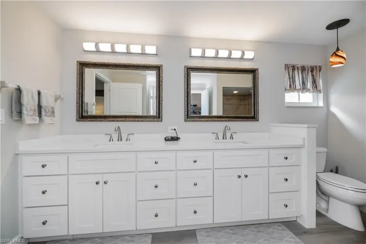 Renovated Bathroom with new double vanity and toilet