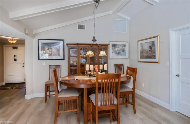 Dining room featuring a chandelier and light wood-style floors