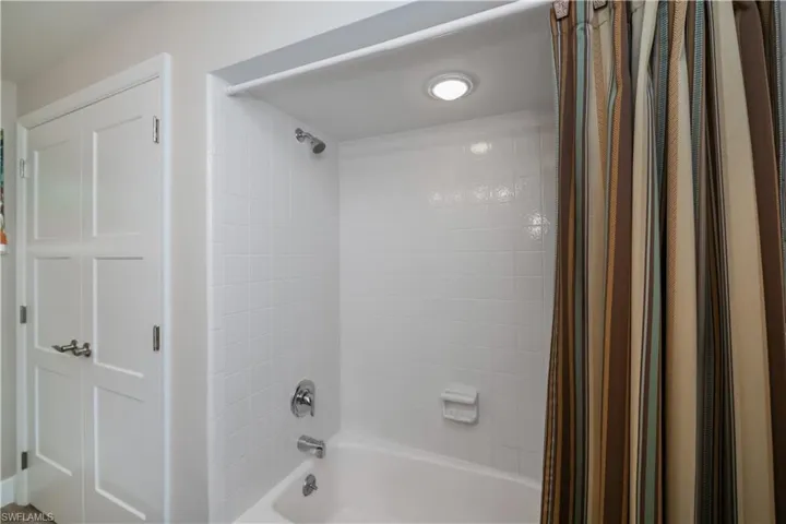 Full bathroom featuring shower / bath combo