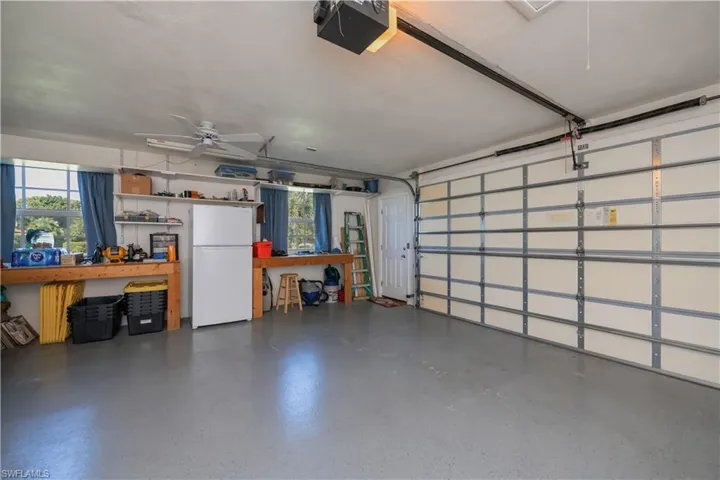 Garage with epoxy flooring and high impact door