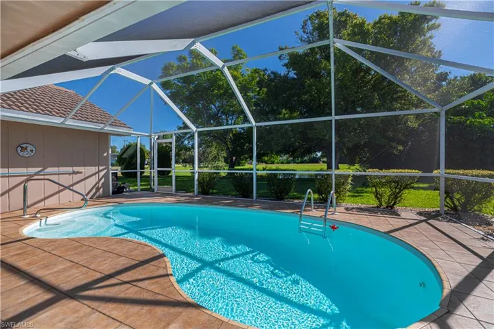 Outdoor pool with lanai, and a patio