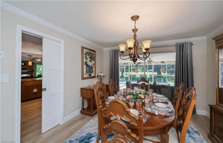 pocket door separates kitchen & dining room.
