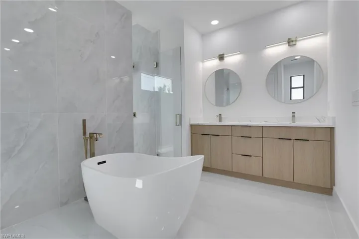Tiled spare room featuring recessed lighting and ceiling fan