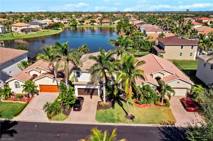 Aerial view of residential area with a nearby body of water