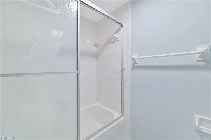 Full bath with enclosed tub / shower combo