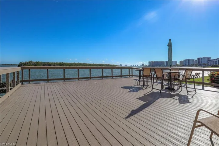 Large Deck featuring a skyline view and a water view of Estero Bay