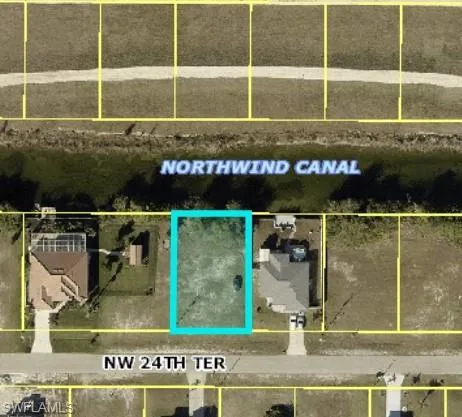 Aerial view of property's location featuring property parcel outlined