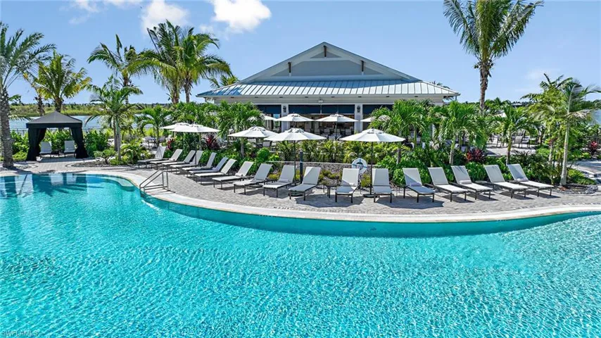 View of swimming pool with a gazebo and a patio