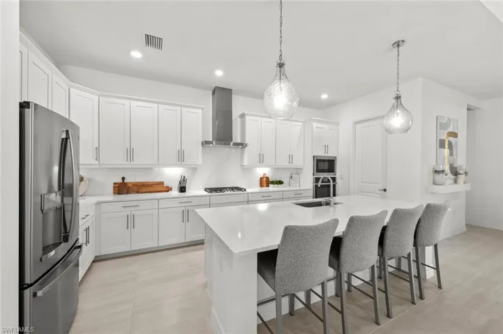 Light, bright gourmet kitchen