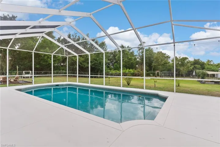 Beautiful Pool with Pool Cage.