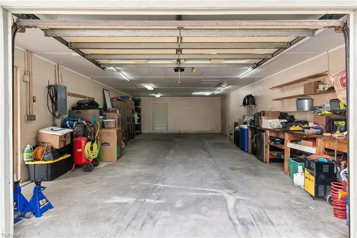 Garage with Air Conditioning, Electricity, and Water.