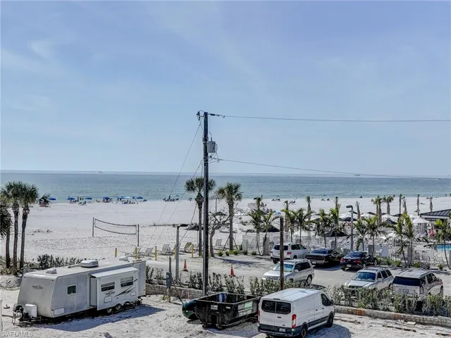 Property view of water with a beach view