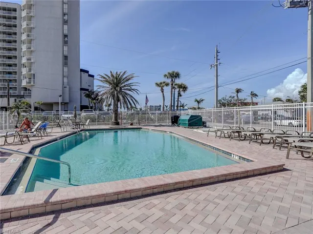 View of swimming pool featuring a patio