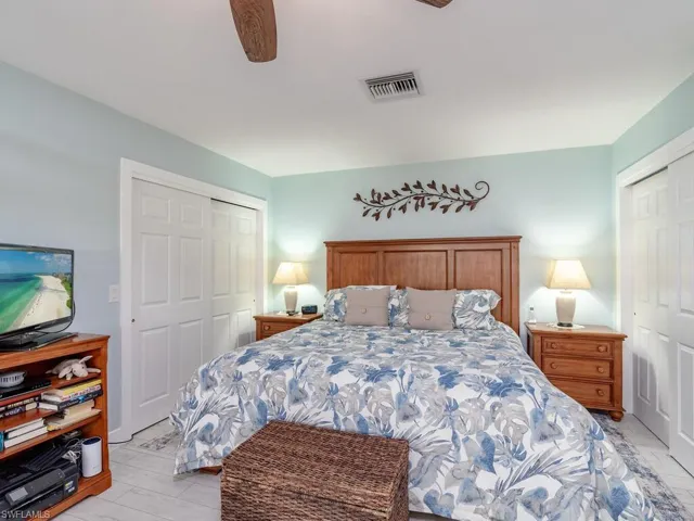 Bedroom with a closet and ceiling fan