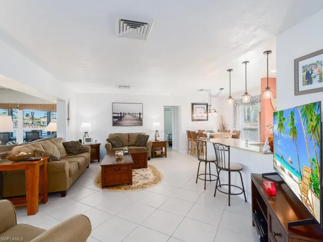 Living area featuring light tile patterned floors