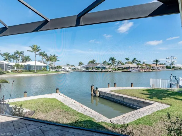 Dock area featuring a water view and a residential view