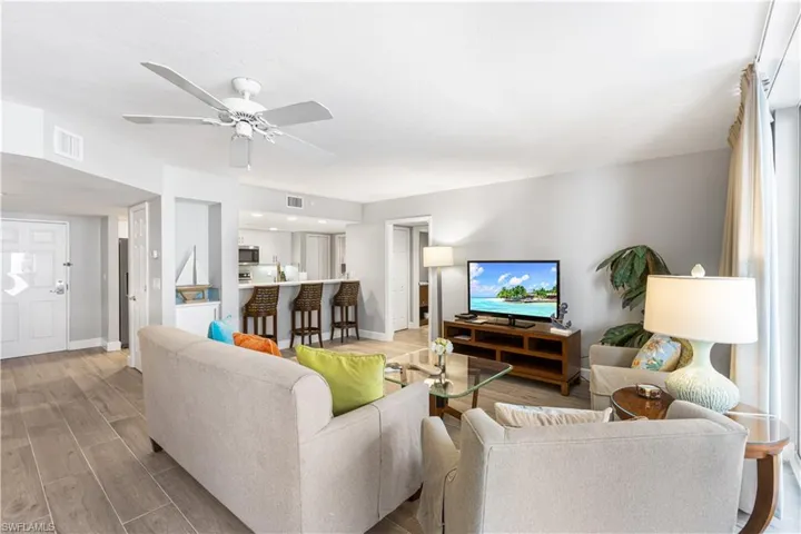 Family Room/Kitchen Bar Stools/ Front Door.....Great Entertainment Area