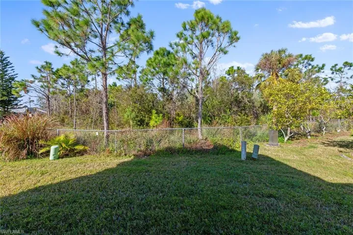 Backs up to a wooded area for a serene private backyard