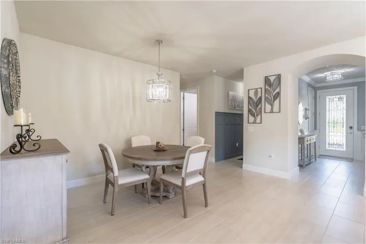 Dining space with a chandelier