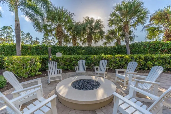 Patio terrace at dusk with an outdoor fire pit