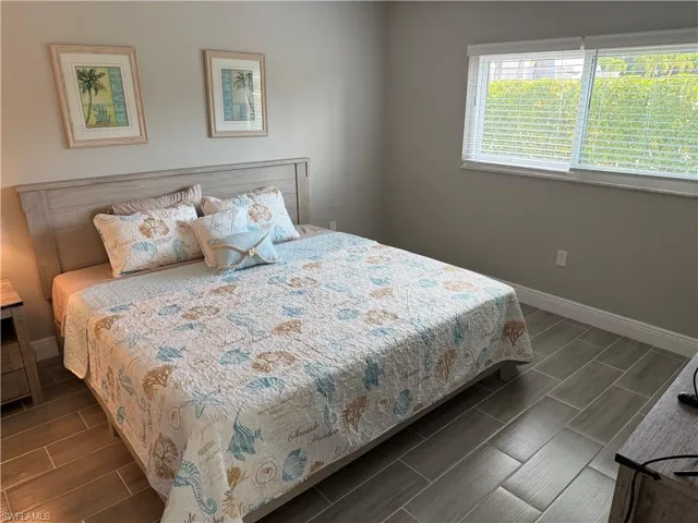 Bedroom featuring wood finish floors