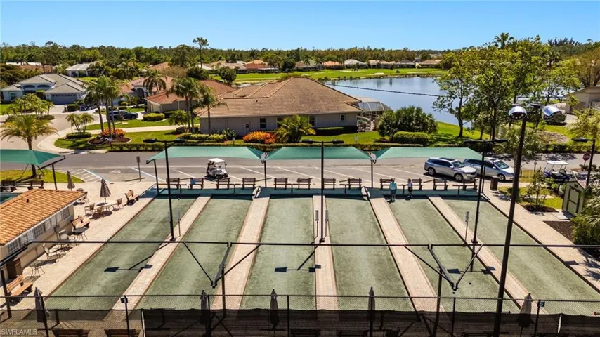 Drone / aerial view with a water view and a residential view