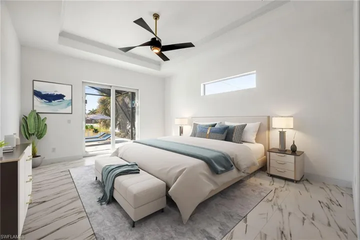 AI Staged photo.  Bedroom featuring a raised ceiling, access to outside, ceiling fan, and light marble finish flooring