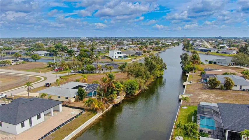 Aerial view of residential area with a large body of water