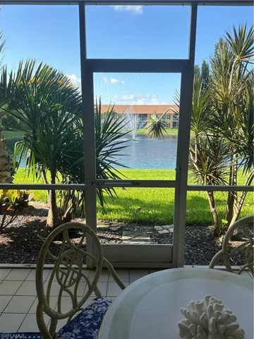 Water and fountain view Details with tile patterned floors