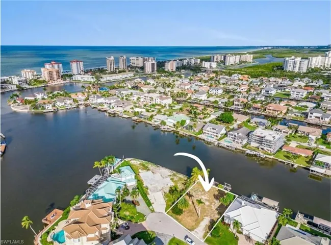 Oversized wide lot with 100 ft of water frontage