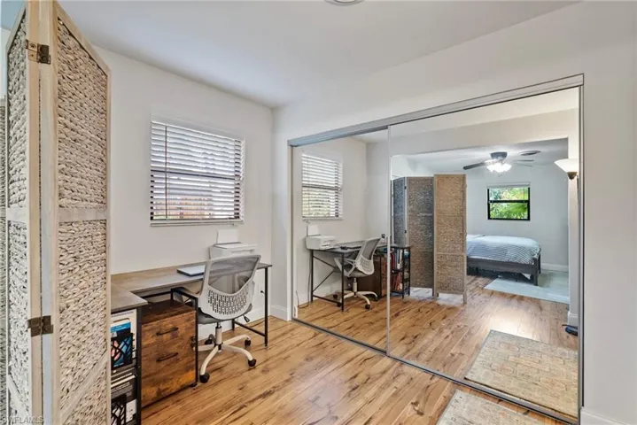 Office featuring ceiling fan and light wood-type flooring