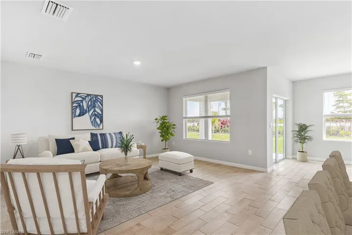 Virtually Staged-Living area featuring healthy amount of natural light