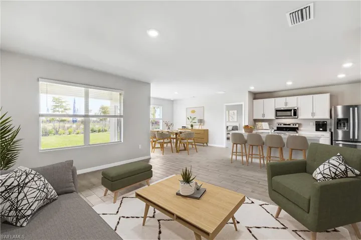 Virtually Staged-Living room featuring recessed lighting and light wood finished floors