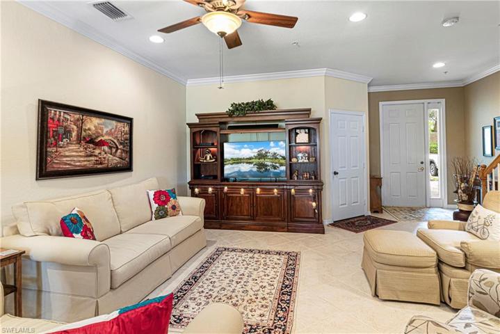 Foyer Entry or garage door entry into Bright and airy living room