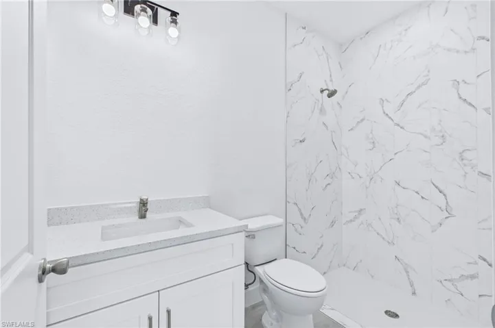 Contemporary primary bathroom with thoughtful design and quality finishes.