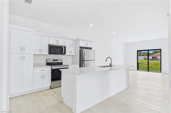 Bright and functional kitchen in Unit 2 perfect for cooking and entertaining.