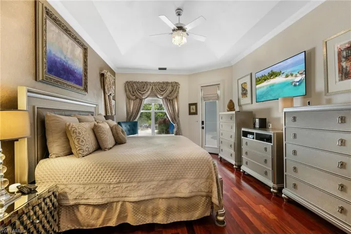 Notice the volume ceilings & impeccable crown moulding throughout the home