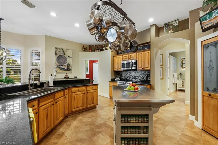 Plenty of cabinets, a walk-in pantry, a 2nd pantry and this substantial island