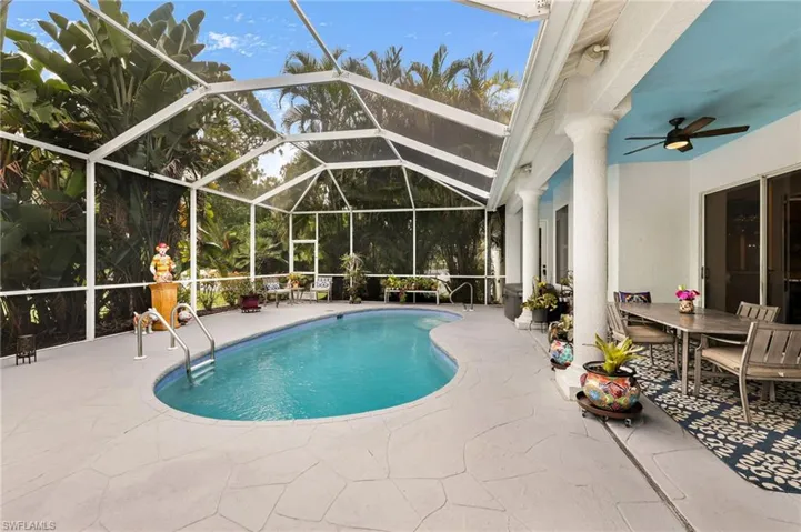 A HUGE screened pool cage at 34' x 24' + the covered 17' x 10' lanai space