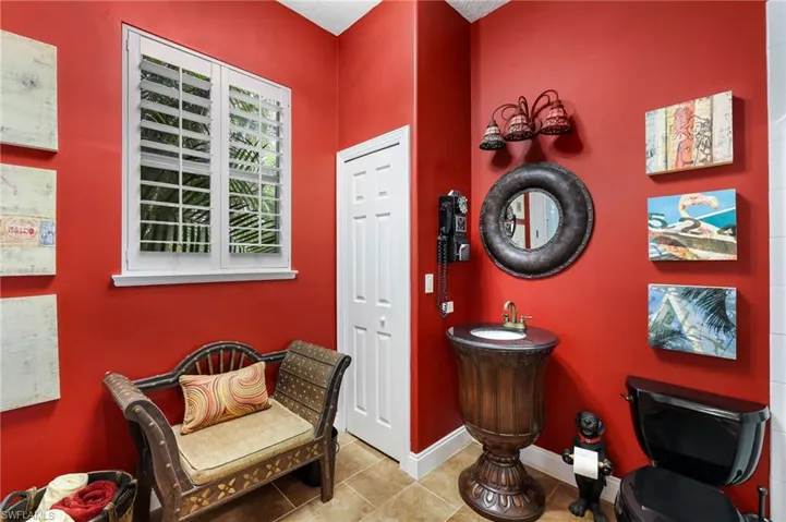 A grand guest bathroom just off the kitchen