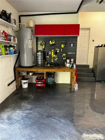 Tool hanging wall, workbench & check out that flooring!