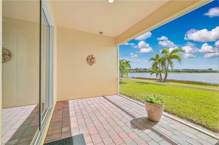 View of patio featuring a water view
