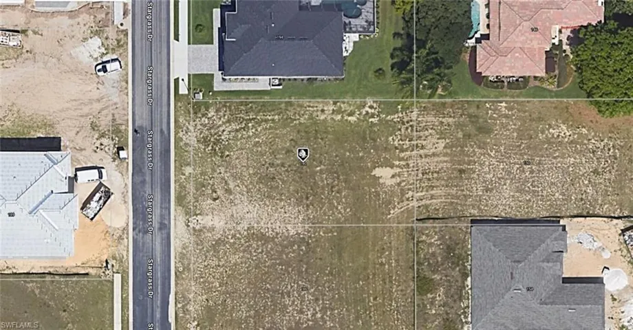 Aerial Survey. Depicting the property’s boundaries and surrounding elements from an overhead perspective